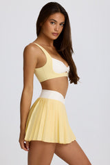 Soft Active Crossover Pleated Mini Skort in Lemon