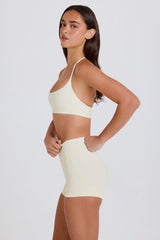 Four-Way Stretch High-Waist Mini Shorts in Cream