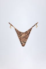 Charm-Detail Thong Bikini Bottoms in Snake Print