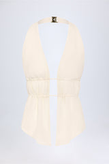 Cut-Out Semi-Sheer Ruched Halterneck Crop Top in Ivory