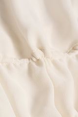 Cut-Out Semi-Sheer Ruched Halterneck Crop Top in Ivory