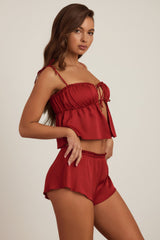 Mid-Rise Flared Shorts in Ruby Red